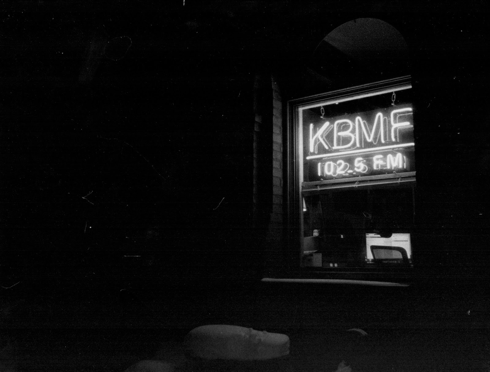 Neon sign at KBMF-LP 102.5 FM